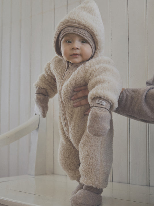 Valge meriinovillane talvekombe armsa teddy-tekstuuriga — soe, hingav ja vastupidav valik beebidele | Emma & Roosi